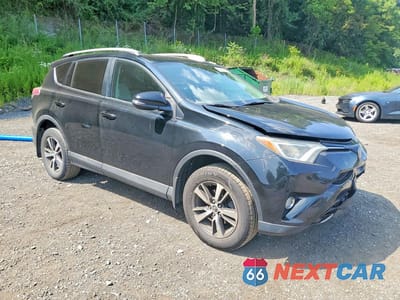 Czwarte zdjęcie samochodu z boku: 2017 TOYOTA RAV4 XLE VIN:2T3RFREV5HW586510 - miniatura