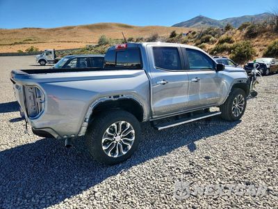 Trzecie zdjęcie samochodu z tyłu: 2026 GMC CANYON DENALI VIN:1GTP2FEK7T1206436 - miniatura