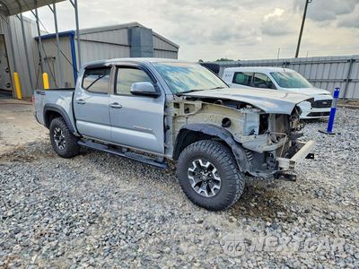 Czwarte zdjęcie samochodu z boku: 2020 TOYOTA TACOMA TRD OFF-ROAD VIN:3TMAZ5CN7LM129370 - miniatura