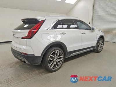 Trzecie zdjęcie samochodu z tyłu: 2020 CADILLAC XT4 PREMIUM LUXURY VIN:1GYFZDR45LF105142 - miniatura