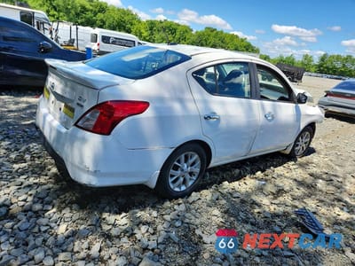 Trzecie zdjęcie samochodu z tyłu: 2017 NISSAN VERSA 1.6 S VIN:3N1CN7AP9HL835308 - miniatura