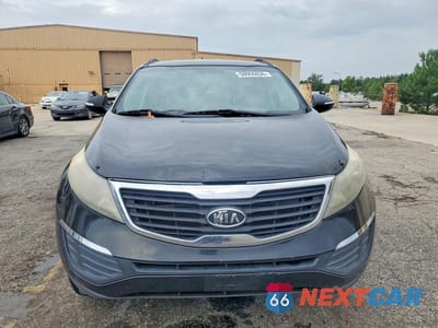 Piąte zdjęcie samochodu w środku: 2012 KIA SPORTAGE LX VIN:KNDPB3A27C7207104 - miniatura