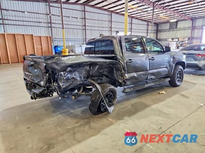 Trzecie zdjęcie samochodu z tyłu: 2022 TOYOTA TACOMA SR5 V6 VIN:3TMAZ5CN9NM168979 - miniatura