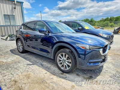 Czwarte zdjęcie samochodu z boku: 2021 MAZDA CX-5 GRAND TOURING VIN:JM3KFBDM3M0438637 - miniatura