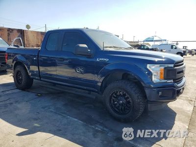 Czwarte zdjęcie samochodu z boku: 2018 FORD F150 SUPER CAB VIN:1FTEX1CB2JKD34900 - miniatura
