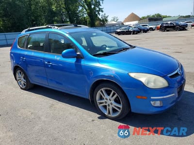 Czwarte zdjęcie samochodu z boku: 2012 HYUNDAI ELANTRA TOURING SE VIN:KMHDC8AE4CU128333 - miniatura