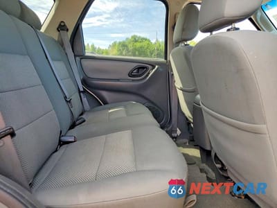 Zdjęcie 10 z 12 samochodu: 2006 FORD ESCAPE XLT VIN:1FMYU93106KC74808 - miniatura