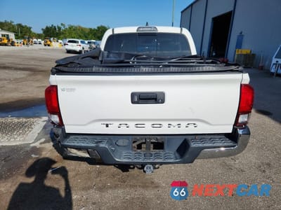 Zdjęcie 6 z 13 samochodu: 2018 TOYOTA TACOMA SR5 V6 VIN:3TMAZ5CN9JM075552 - miniatura
