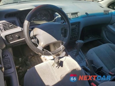 Zdjęcie 8 z 12 samochodu: 2001 TOYOTA CAMRY LE VIN:4T1BG22KX1U864705 - miniatura