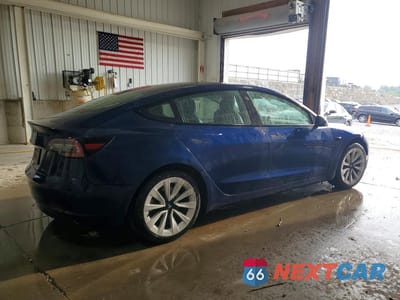 Trzecie zdjęcie samochodu z tyłu: 2022 TESLA MODEL 3 VIN:5YJ3E1EA7NF303789 - miniatura