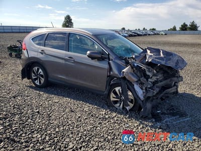 Czwarte zdjęcie samochodu z boku: 2016 HONDA CR-V TOURING VIN:5J6RM4H90GL133995 - miniatura