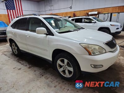 Czwarte zdjęcie samochodu z boku: 2006 LEXUS RX 330 VIN:2T2GA31U36C049234 - miniatura