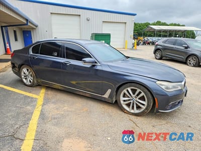 Czwarte zdjęcie samochodu z boku: 2016 BMW 750 I VIN:WBA7F0C51GGL99651 - miniatura