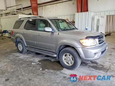 Czwarte zdjęcie samochodu z boku: 2003 TOYOTA SEQUOIA SR5 VIN:5TDBT44A23S174308 - miniatura