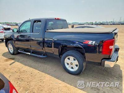 Trzecie zdjęcie samochodu z tyłu: 2013 CHEVROLET SILVERADO K1500 LT VIN:1GCRKSE70DZ172176 - miniatura