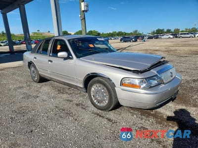 Czwarte zdjęcie samochodu z boku: 2003 MERCURY GRAND MARQUIS GS VIN:2MEFM74W43X703207 - miniatura