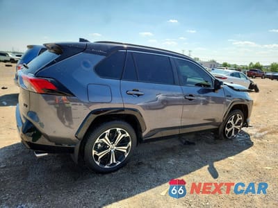 Trzecie zdjęcie samochodu z tyłu: 2023 TOYOTA RAV4 PRIME XSE VIN:JTMFB3FV0PD134163 - miniatura