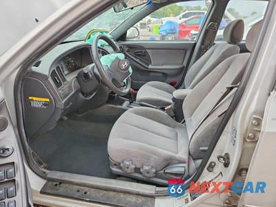 Zdjęcie 7 z 12 samochodu: 2005 HYUNDAI ELANTRA GLS VIN:KMHDN46D15U081526 - miniatura