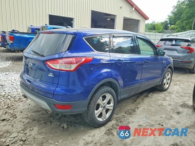 Trzecie zdjęcie samochodu z tyłu: 2015 FORD ESCAPE SE VIN:1FMCU9GX8FUA34709 - miniatura