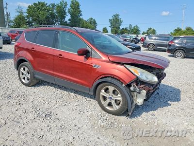 Czwarte zdjęcie samochodu z boku: 2016 FORD ESCAPE SE VIN:1FMCU9GX1GUA32883 - miniatura
