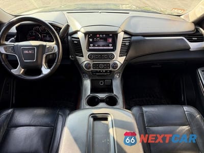 Zdjęcie 9 z 10 samochodu: 2015 GMC YUKON SLT VIN:1GKS2BKC7FR192922 - miniatura