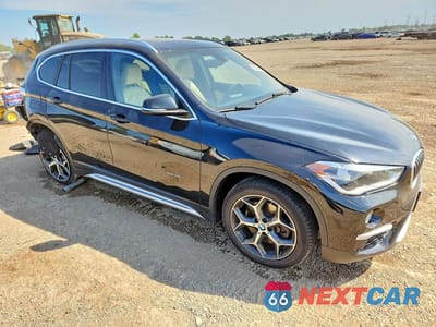 Czwarte zdjęcie samochodu z boku: 2016 BMW X1 XDRIVE28I VIN:WBXHT3C35GP884376 - miniatura