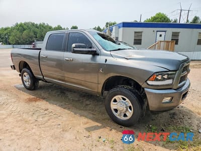 Czwarte zdjęcie samochodu z boku: 2012 DODGE RAM 2500 SLT VIN:3C6UD5DL9CG284887 - miniatura