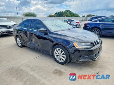 Czwarte zdjęcie samochodu z boku: 2014 VOLKSWAGEN JETTA VIN:3VWD07AJ8EM364220 - miniatura