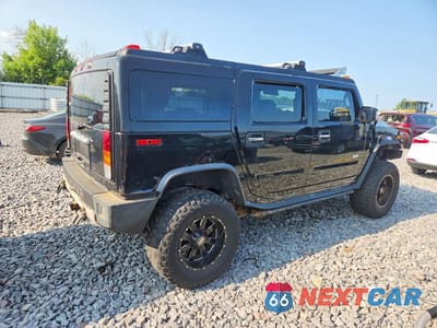 Trzecie zdjęcie samochodu z tyłu: 2004 HUMMER H2 VIN:5GRGN23U44H118018 - miniatura