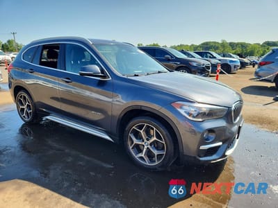 Czwarte zdjęcie samochodu z boku: 2017 BMW X1 XDRIVE28I VIN:WBXHT3C3XH5F81805 - miniatura