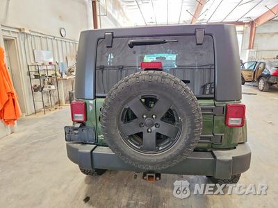 Zdjęcie 6 z 13 samochodu: 2008 JEEP WRANGLER UNLIMITED SAHARA VIN:1J4GA59108L521440 - miniatura