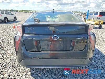 Zdjęcie 6 z 13 samochodu: 2017 TOYOTA PRIUS TWO VIN:JTDKBRFU9H3546632 - miniatura