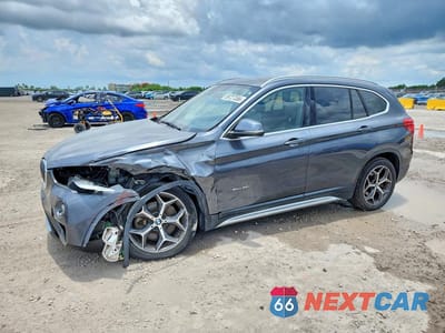 2018 BMW X1 WBXHU7C3XJ5H45838 - główne zdjęcie licytacji z USA - miniatura