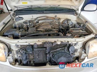 Zdjęcie 12 z 13 samochodu: 2002 TOYOTA SEQUOIA LIMITED VIN:5TDBT48AX2S118142 - miniatura