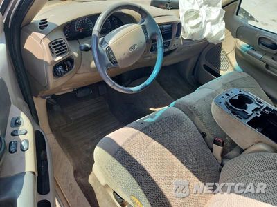 Zdjęcie 8 z 12 samochodu: 2001 FORD F150 VIN:1FTZX07261KF29064 - miniatura