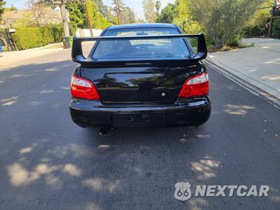 Zdjęcie 13 z 13 samochodu: 2004 SUBARU IMPREZA WRX STI VIN:JF1GD70694L521776 - miniatura