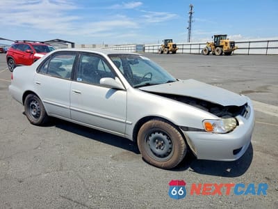 Czwarte zdjęcie samochodu z boku: 2002 TOYOTA COROLLA LE VIN:1NXBR12E22Z584227 - miniatura