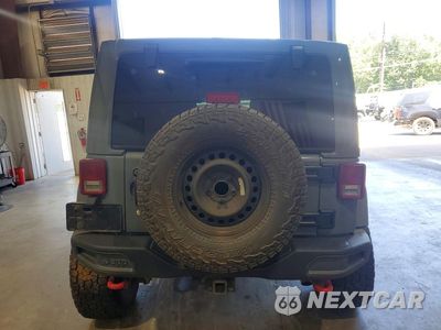 Zdjęcie 6 z 12 samochodu: 2013 JEEP WRANGLER UNLIMITED RUBICON VIN:1C4BJWFGXDL689501 - miniatura