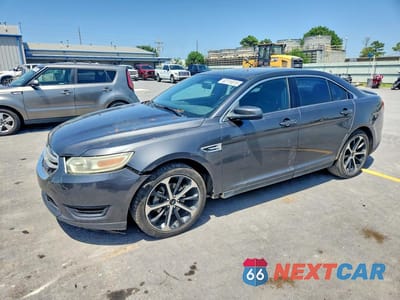2015 FORD TAURUS SEL 1FAHP2E80FG195791 - główne zdjęcie licytacji z USA - miniatura