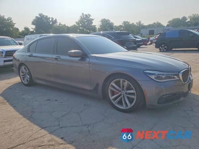 Czwarte zdjęcie samochodu z boku: 2016 BMW 750 XI VIN:WBA7F2C52GG419305 - miniatura