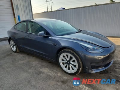Czwarte zdjęcie samochodu z boku: 2022 TESLA MODEL 3 VIN:5YJ3E1EA1NF286889 - miniatura