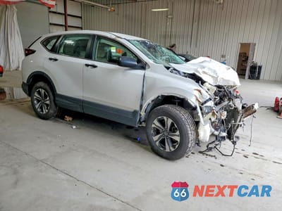 Czwarte zdjęcie samochodu z boku: 2021 HONDA CR-V LX VIN:2HKRW2H2XMH633928 - miniatura
