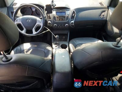 Zdjęcie 8 z 12 samochodu: 2012 HYUNDAI TUCSON GLS VIN:KM8JU3ACXCU515258 - miniatura