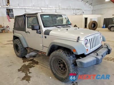 Czwarte zdjęcie samochodu z boku: 2011 JEEP WRANGLER SPORT VIN:1J4AA2D10BL511266 - miniatura