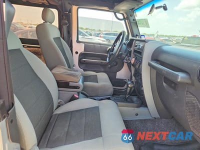 Zdjęcie 10 z 12 samochodu: 2010 JEEP WRANGLER SPORT VIN:1J4AA2D10AL167632 - miniatura