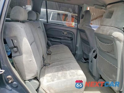 Zdjęcie 11 z 13 samochodu: 2004 HONDA PILOT EX VIN:2HKYF18454H560782 - miniatura