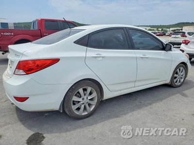 Trzecie zdjęcie samochodu z tyłu: 2014 HYUNDAI ACCENT GLS VIN:KMHCU4AEXEU760886 - miniatura