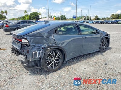 Trzecie zdjęcie samochodu z tyłu: 2024 TOYOTA PRIUS XLE VIN:JTDACAAU4R3035669 - miniatura