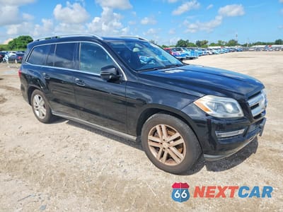 Czwarte zdjęcie samochodu z boku: 2014 MERCEDES-BENZ GL 450 4MATIC VIN:4JGDF7CE9EA280434 - miniatura