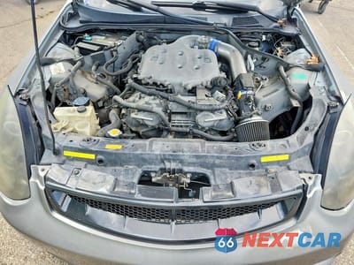 Zdjęcie 11 z 12 samochodu: 2004 INFINITI G35 BASE VIN:JNKCV54E74M813219 - miniatura